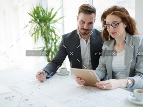 demo-attachment-818-portrait-of-young-architect-woman-on-meeting-KFZCE3A